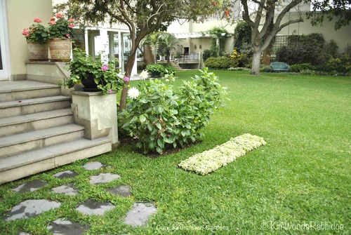 Note the quirky addition of the flower carpet - one of several punctuation dashes breaking the monotony of a vast lawn.