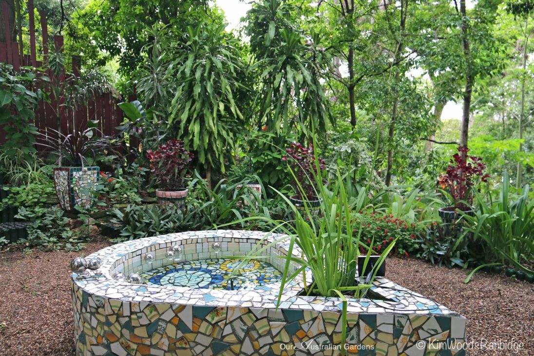 The tear-shaped pond is the central feature in the Hidden Garden.